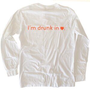 Drunk Elephant White Long Sleeve T-Shirt with Orange Logo "drunk in 🧡"